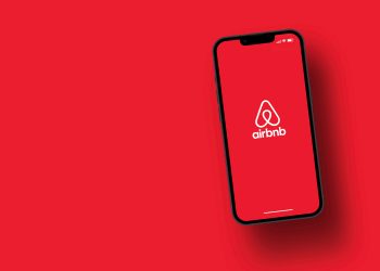 Airbnb,App,On,Smartphone,Screen,With,Large,Shadow,Giving,The