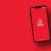Airbnb,App,On,Smartphone,Screen,With,Large,Shadow,Giving,The